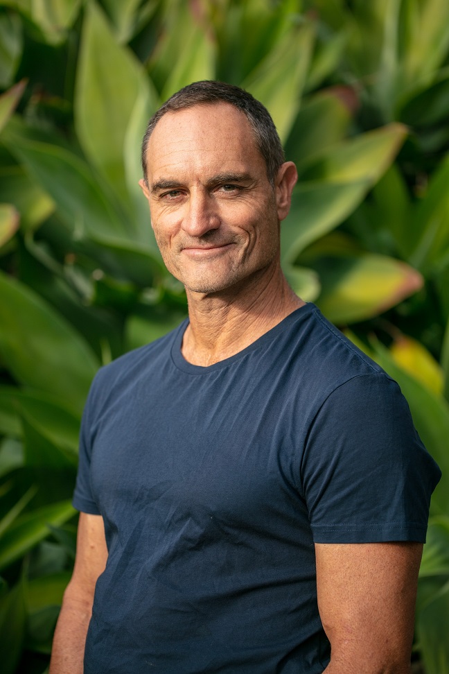 Profile photo of Robert Brownhall with plants in background